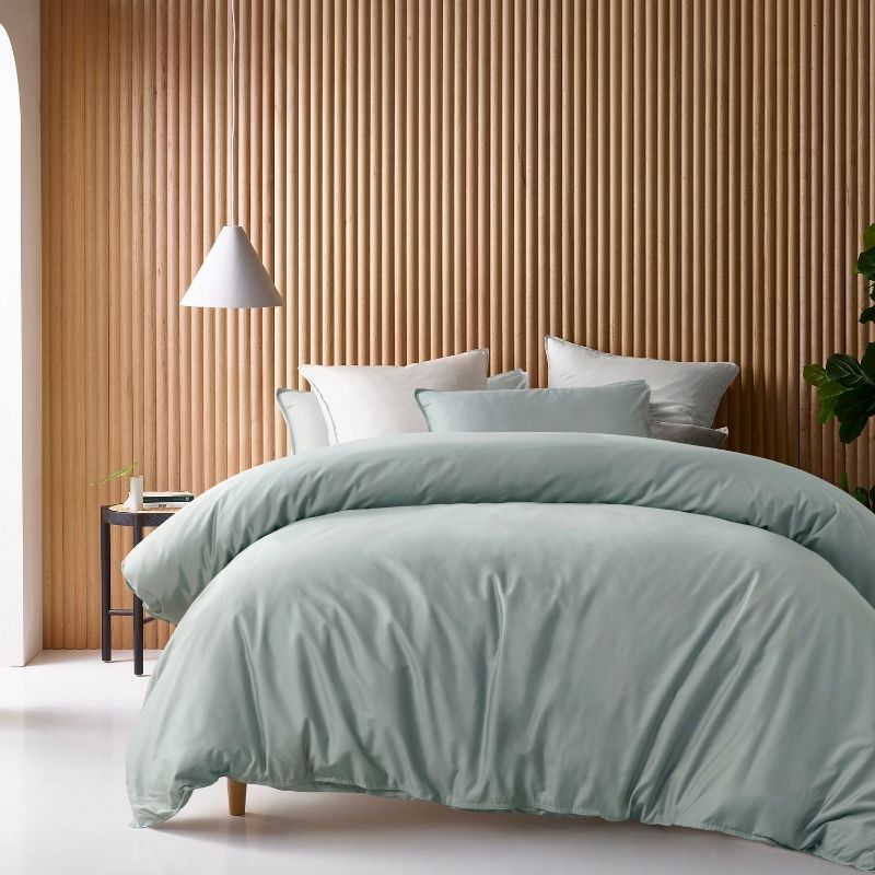 Accessorize Bamboo Cotton Double Stitch Sage Quilt Cover styled on bed.