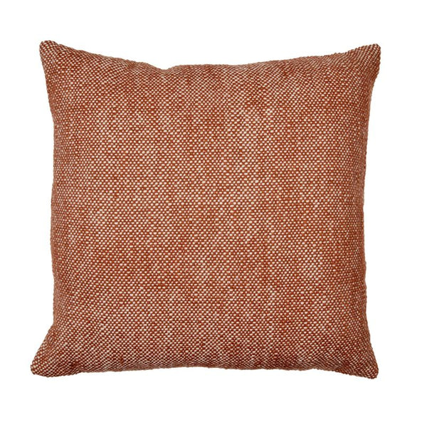 Close-up of textured rust-toned basket weave cushion.
