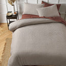 Soft and breathable waffle quilt cover in natural colour, shown with pillowcases.