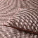 Accessorize Hokey Pokey Waffle Comforter in warm tobacco adding texture and depth.