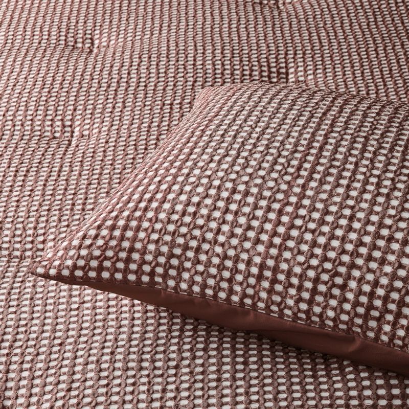 Accessorize Hokey Pokey Waffle Comforter in warm tobacco adding texture and depth.