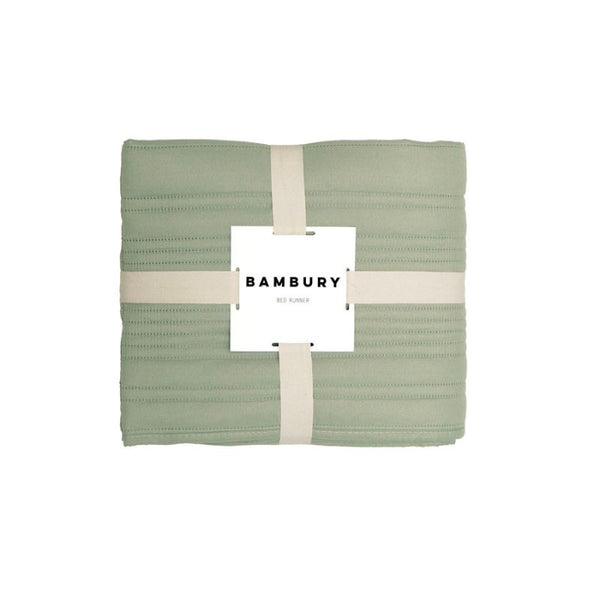 Sage quilted bed runner by Bambury in packaging, ready for styling.