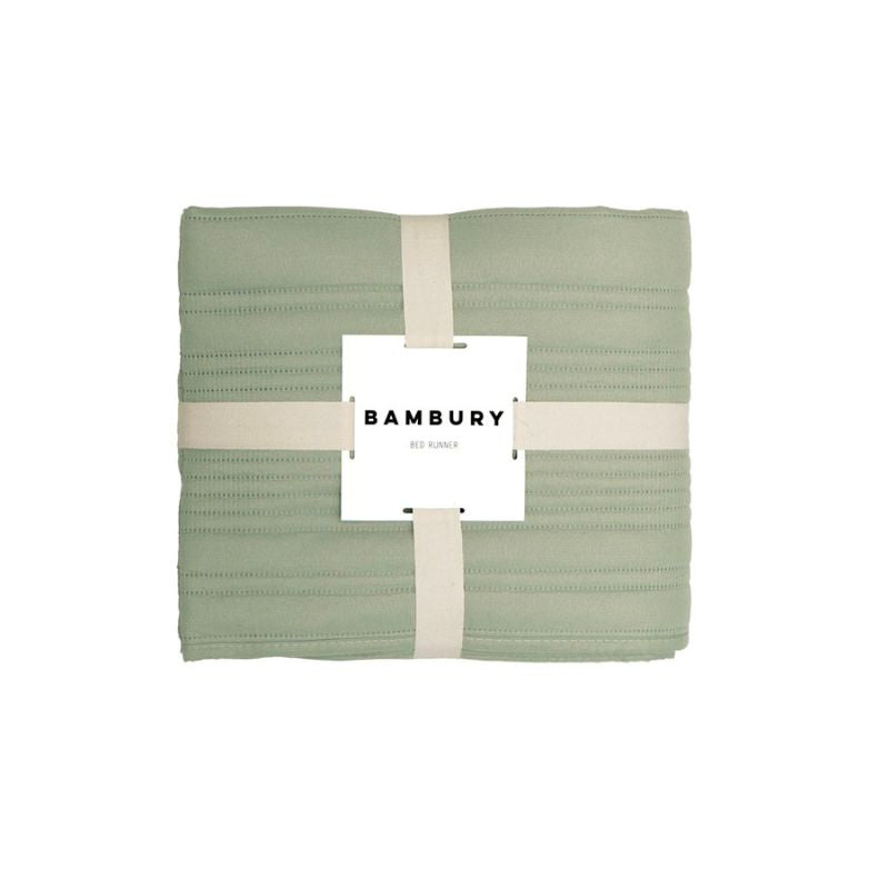 Sage quilted bed runner by Bambury in packaging, ready for styling.