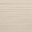 Soft neutral coverlet set paired with light cushions and timber bedside table.