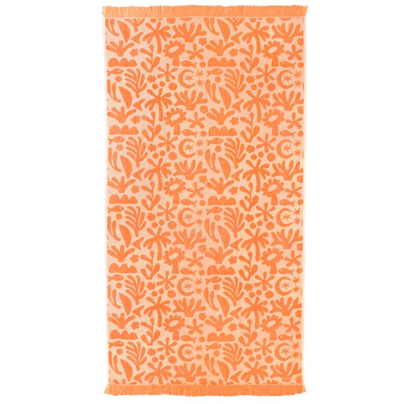 Peach-coloured beach towel with fringe edge and soft velour finish, perfect for summer.
