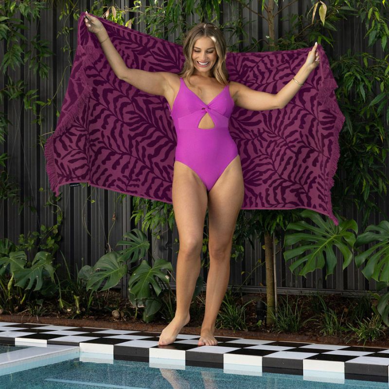Bambury HiLo Nori Berry Beach Towel featuring a raised textured leaf pattern in rich berry tones.