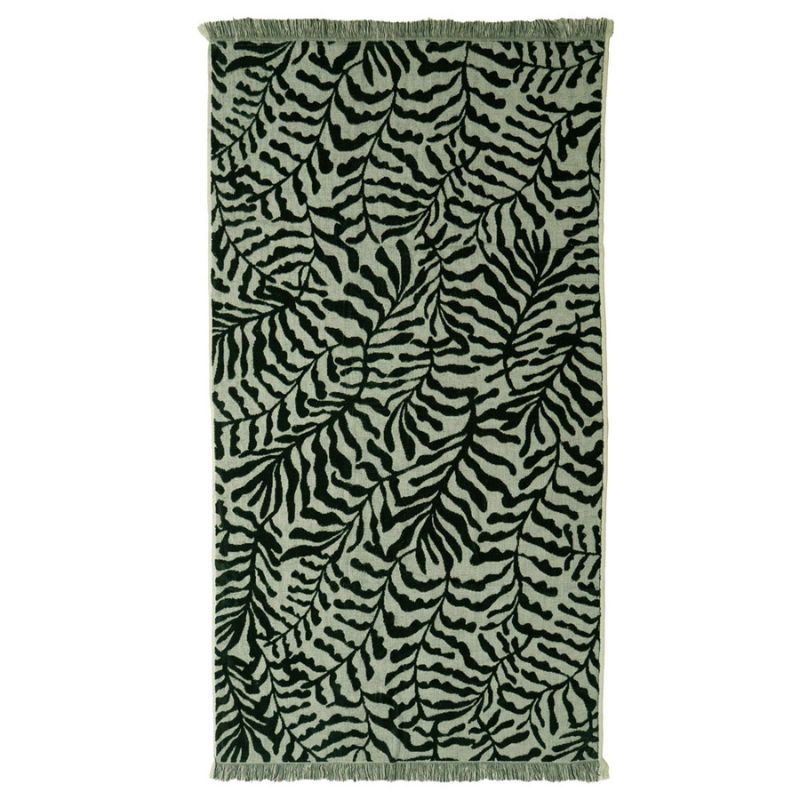 Luxurious green cotton beach towel with soft raised pattern and fringe edges.