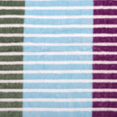 The Bambury Jacquard Strata Beach Blanket combines comfort and colour in the best way possible. Made from soft, high-quality cotton, it’s perfect for warm days spent outdoors. Its lively mix of stripes in yellow, purple, green, and blue adds personality to your summer adventures, whether at the beach, by the pool, or in the park. Stylish, practical, and made to last — this is your go-to blanket for sunshine and good times.
