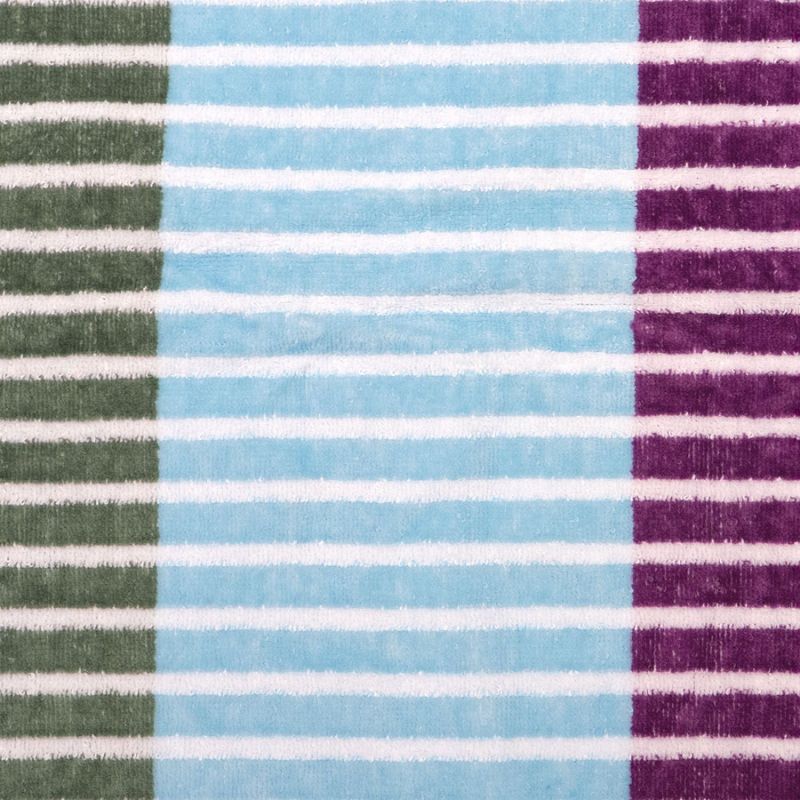 The Bambury Jacquard Strata Beach Blanket combines comfort and colour in the best way possible. Made from soft, high-quality cotton, it’s perfect for warm days spent outdoors. Its lively mix of stripes in yellow, purple, green, and blue adds personality to your summer adventures, whether at the beach, by the pool, or in the park. Stylish, practical, and made to last — this is your go-to blanket for sunshine and good times.