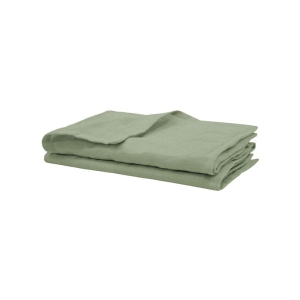 Close-up of soft French flax linen fabric in sage green.