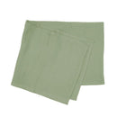 Bambury French Flax Linen Sage Table Runner styled on marble dining table.