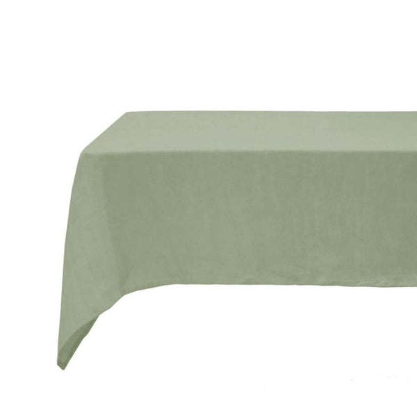 Close-up of soft sage green French linen fabric texture.