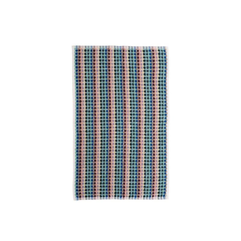 Retro-inspired Bambury Miami Pom Pom Hand Towel styled in a modern bathroom.
