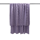Lightweight knitted lilac throw blanket by Bambury styled for everyday comfort.