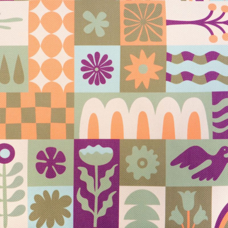 Patchwork pattern with geometric shapes and floral elements in a grid layout.