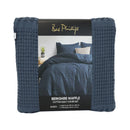 Blue haze waffle quilt cover set with matching pillowcases and beige headboard