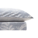 Relaxed modern bedroom look with blue jacquard quilt cover adding texture and softness.