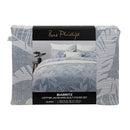 Relaxed modern bedroom look with blue jacquard quilt cover adding texture and softness.