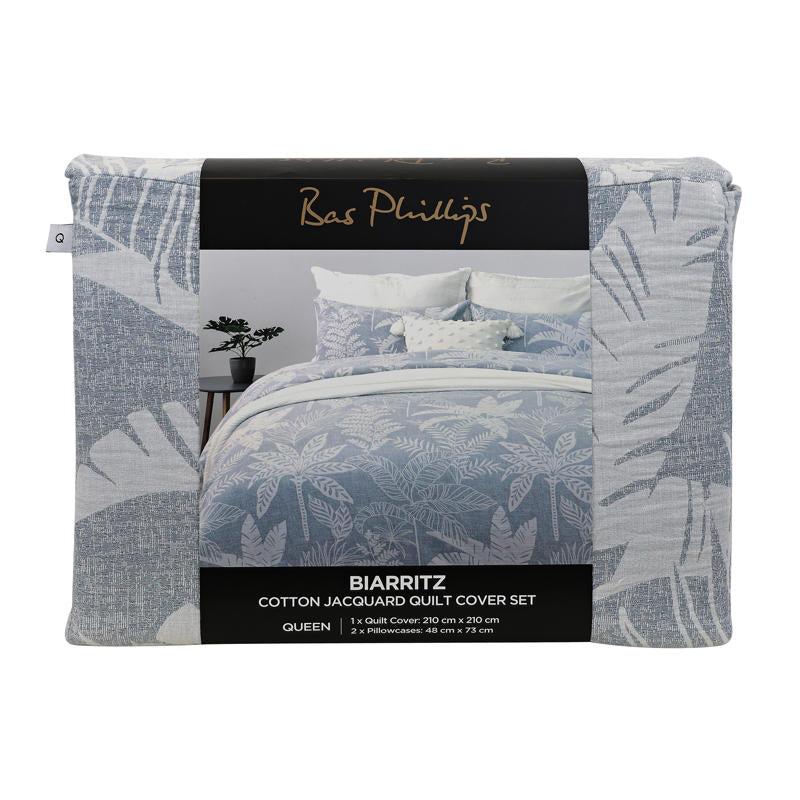 Relaxed modern bedroom look with blue jacquard quilt cover adding texture and softness.