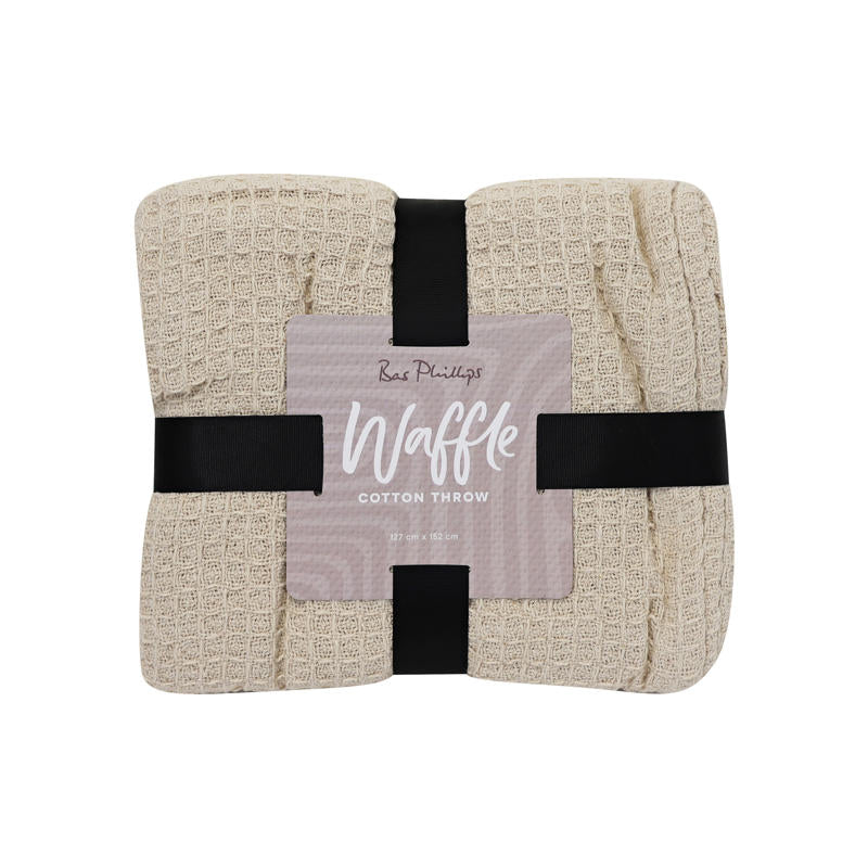 Lightweight natural cotton throw perfect for sofa or bed layering.