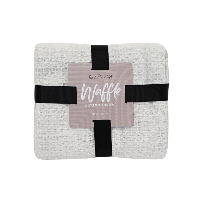 Lightweight white cotton throw perfect for sofa or bed styling.