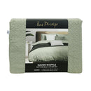 Moss green waffle quilt cover set with matching pillowcases on a neutral headboard bed.