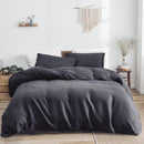 Bedroom featuring Bas Phillips Monaco Slate Quilt Cover and matching pillowcases.