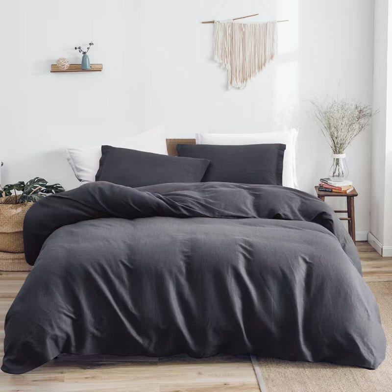 Bedroom featuring Bas Phillips Monaco Slate Quilt Cover and matching pillowcases.