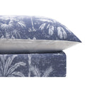 Textured blue quilt cover adding a tropical, relaxed feel to the room.