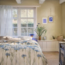 Bedding House Cornflower Sand Quilt Cover Set with blue floral design on neutral base.