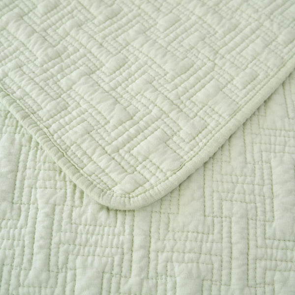 Lightweight quilted throw in a refreshing milky green tone.