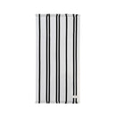 Lightweight striped cotton beach towel with fringed ends in black and cream
