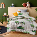 Kids’ bedding set with tractors, harvesters, and balers in green prints.