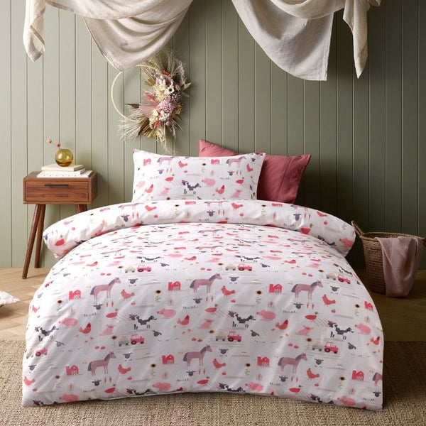 Close-up of farmyard animal print featuring horses, pigs, and chickens.