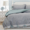 Floral quilt cover set creating a calm, classic bedroom look.