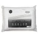Close-up of plush high-loft Ardor mattress topper on bed.