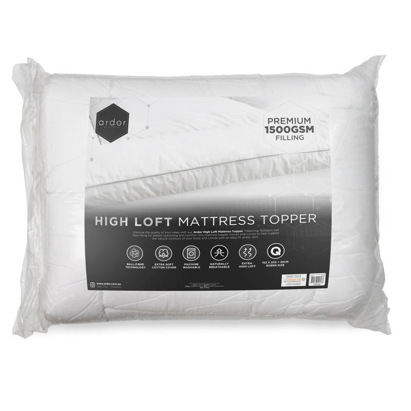 Close-up of plush high-loft Ardor mattress topper on bed.