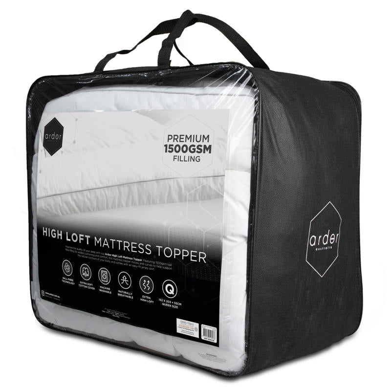 Close-up of plush high-loft Ardor mattress topper on bed.