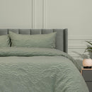 Ardor Boudoir Adeline Sage Quilt Cover Set styled on bed with textured chenille pattern.