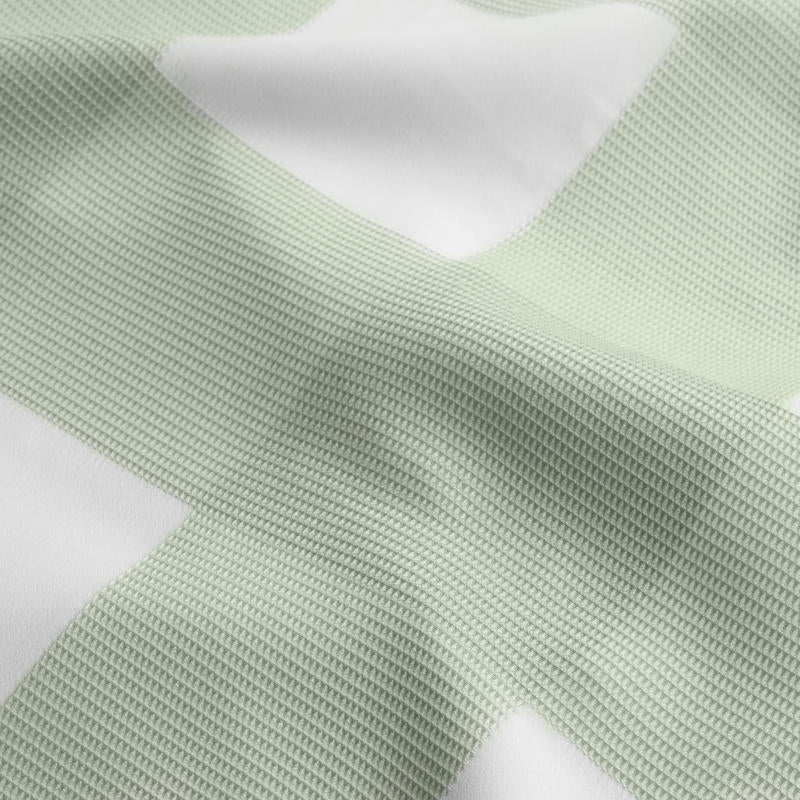 Soft and breathable sage quilt cover set with modern design.