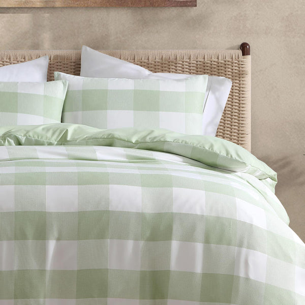Soft and breathable sage quilt cover set with modern design.
