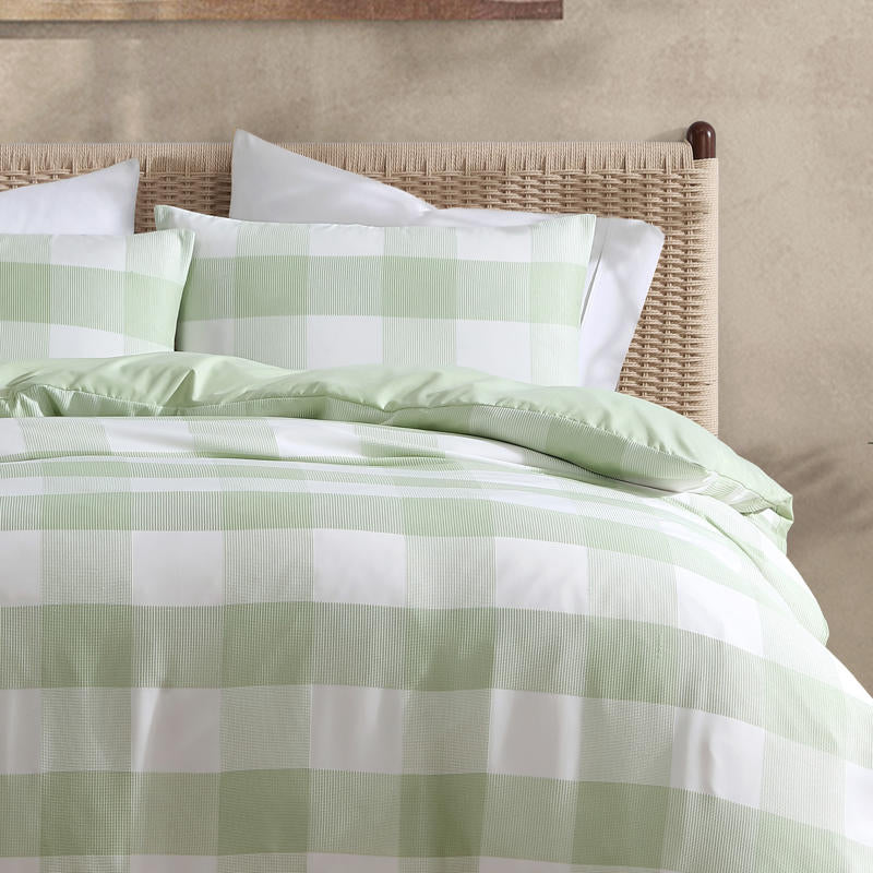 Soft and breathable sage quilt cover set with modern design.