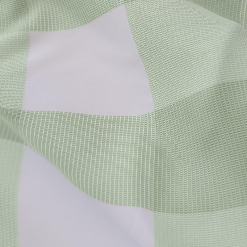 Soft and breathable sage quilt cover set with modern design.