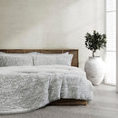 Faux fur comforter set in silver tone with matching pillowcases.