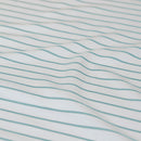 Classic blue and white stripes evoke relaxed coastal charm and timeless appeal.