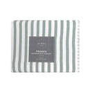 Coastal-inspired sage and white stripe quilt cover set in a relaxed modern bedroom.