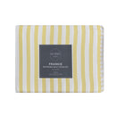 Bright and cheerful yellow stripe quilt cover set in a modern bedroom.