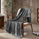 Ardor Boudoir Jasper Charcoal Boucle Throw styled in a cosy living room