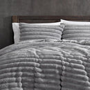 Luxurious faux fur quilt cover set with matching pillowcases.