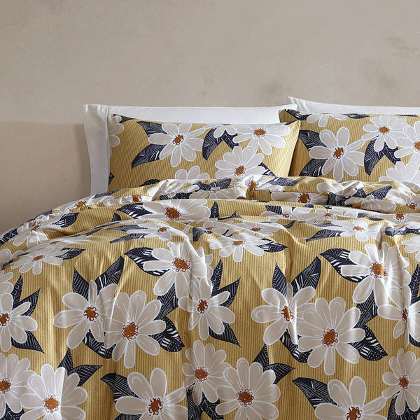 Playful floral design with large white blooms and deep navy leaves adds personality and a touch of retro elegance.